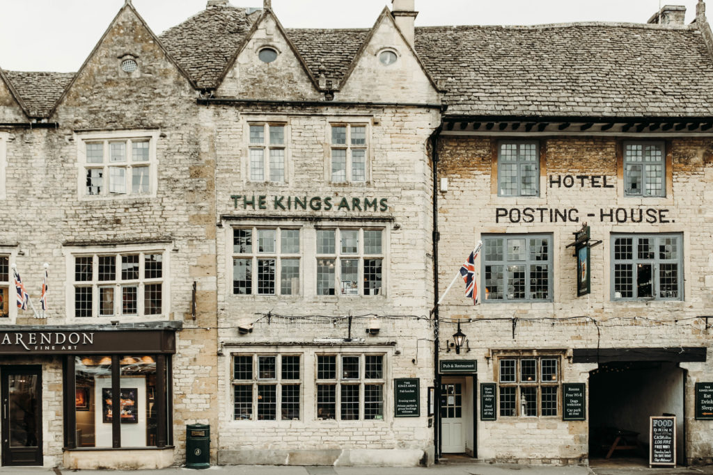 A view of a post office and hotel in Stow-on-the-Wold in the Cotswolds in England